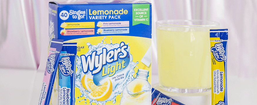 Lemonade Variety Pack Box With a Glass of Lemonade, Wyler's Light Lemonade Variety Pack, Lemonade Flavored Water Variety Pack